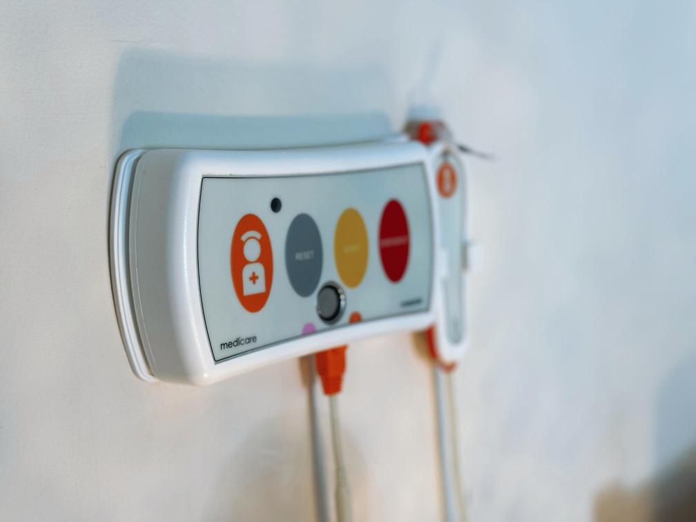 Closeup of a nurse call alarm system.